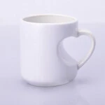 ЧАШКА ДЛЯ СУБЛІМАЦІЇ БІЛА З РУЧКОЮ У ВИГЛЯДІ СЕРЦЯ 300мл
